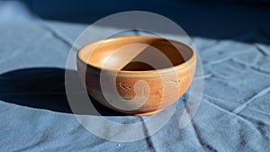 A soft shadow indicating a light source from above and to the