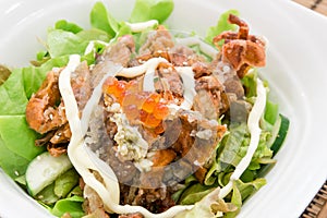 Soft shell crab salad with saolmon eggs