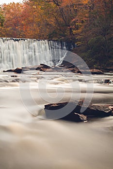 Soft slow moving creek below a dam