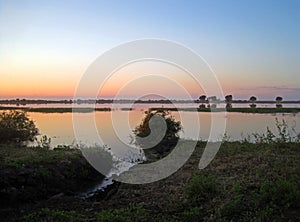 SOFT SUNSET COLOURS OVER CHOBE RIVER