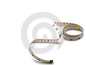 A soft tailor measuring tape isolated on a white background with copy space