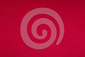 Soft texture of the fabric in bright red. High resolution photo. felt or fleecy textile