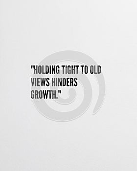 Soft White Background with Holding Tight to Old Views Hinders Growth Quote for Inspiration Office Canvas
