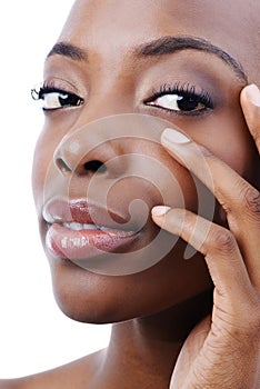 Soft to the touch. Closeup studio shot of a beautiful african american model isolated on white.