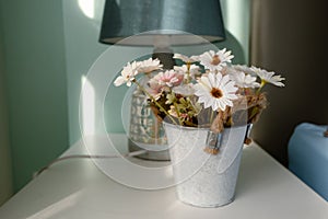 Soft tone beautiful flower in the jar