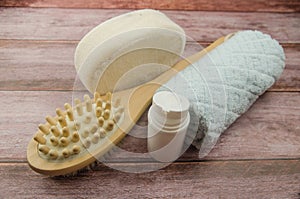 Soft towel and bath accessories on table