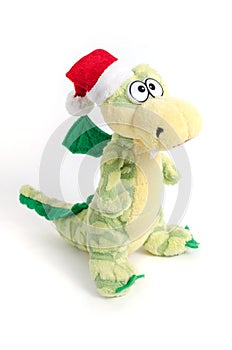 Soft toy dragon isolated on white background photo