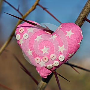 Soft toy in the shape of a heart. Handicraft work