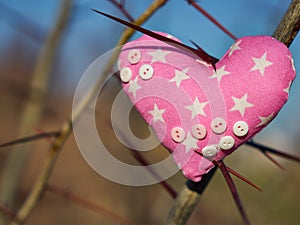 Soft toy in the shape of a heart. Handicraft work