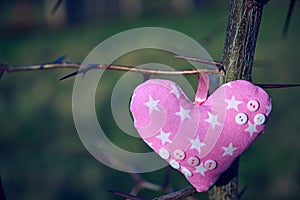 Soft toy in the shape of a heart. Handicraft work