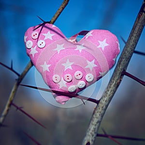 Soft toy in the shape of a heart. Handicraft work