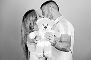 Soft toy teddy bear gift. Pregnancy concept. Man and woman couple in love. Future parents. Family love. Man and pretty