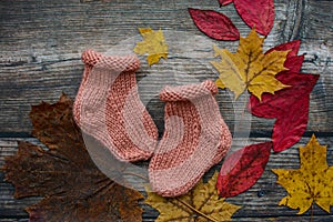 Soft and warm baby socks on dark background