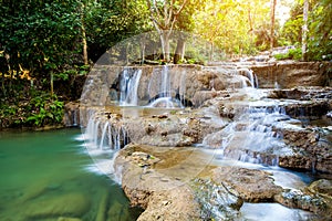 soft water of the stream in the natural park, Beautiful waterfall in rain forest ( Maekampong Waterfall, Thailand).