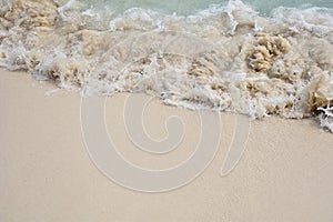 Soft wave on the beach for background