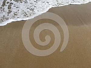 Soft wave of Black Sea on sandy beach
