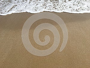 Soft wave of Black Sea on sandy beach