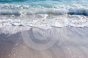 Soft wave of Black sea on sandy beach