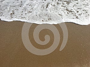 Soft wave of Black Sea on sandy beach