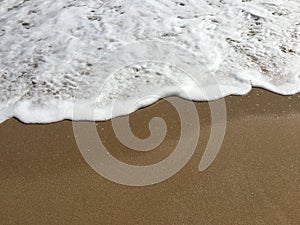 Soft wave of Black Sea on sandy beach