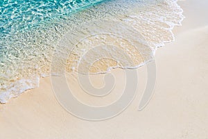 Soft wave of blue ocean on sandy beach. Background. - Image