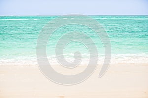 Soft wave of blue ocean on sandy beach. background. selective focus. beach and tropical sea white foam on beach.