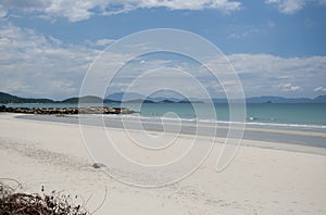 Soft wave of blue ocean on a sandy beach. With the blur. Toning