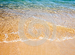 Soft wave of the sea on the sandy beach