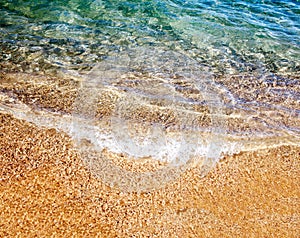 Soft wave of the sea on the sandy beach