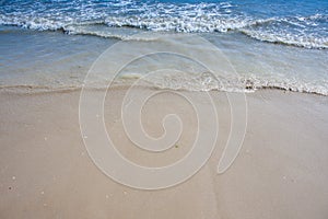 Soft wave of the sea on the sandy beach