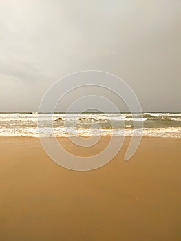 Soft wave sea on the sandy beach in summer