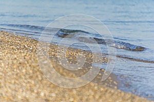 Soft wave of sean on sandy beach. Background.