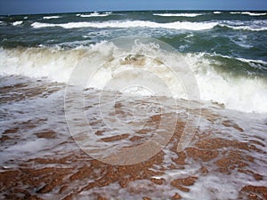 Soft wave splash on sea or ocean. Incredible foamy waves