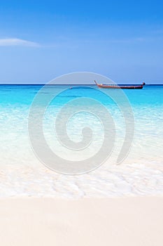 Soft waves of blue ocean on sandy beach. Scenery landscape of tropical sea in the sunshine day, erotic turquoise seawater and