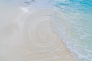 Soft waves and sandy beach