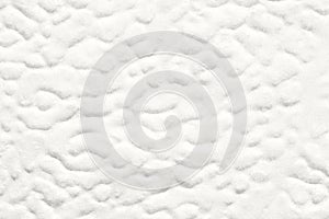 Soft white abstract textured surface with organic cloudlike pattern creating calm minimal neutral