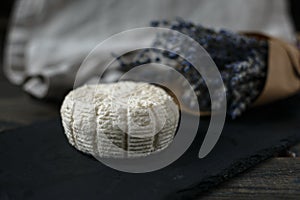 Soft white cheese on the black board