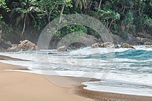 Soft white waves on the beach