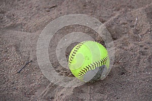 Softball in dirt