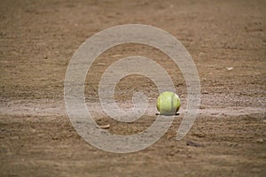 Softball in dirt