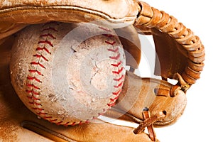 Softball in mitt isolated