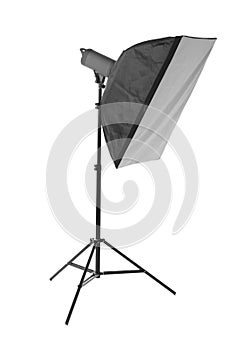 A softbox isolated on the white background. A professional stripbox. Photo studio equipment. Flashlight and outbreak.