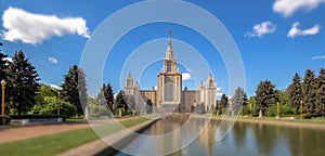 Soften edge sunny view of Moscow university under blue cloudy sky in summer