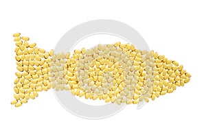 Softgels of Omega-3 in shape of fish on whight isolated background. Fish oil on a white background. Yellow capsules with