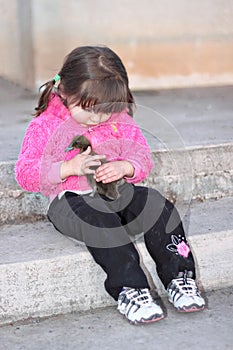 Softness - Girl Holding Baby Duck