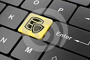 Software concept: Database With Shield on computer keyboard background