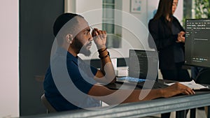 Software developer brainstorming ideas to write code and create new interface