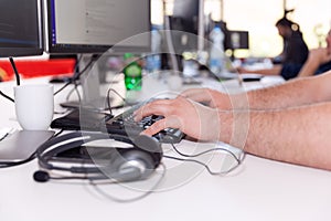 Software developer, coder or programmer working on computer