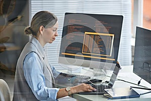 Software Developer Coding on Laptop