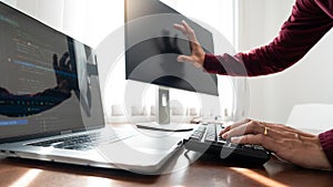 Software developer or programmer working data debugging improvement binary algorithm on desktop pc in a software develop company